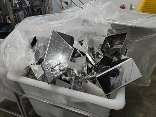 High Tek HTMW-T2-2.5X-XX(SS-2.5G) Multihead Weigher and HTRP-R8-200SS Pre-Made Pouch Bagger with Infeed Bucket Elevator