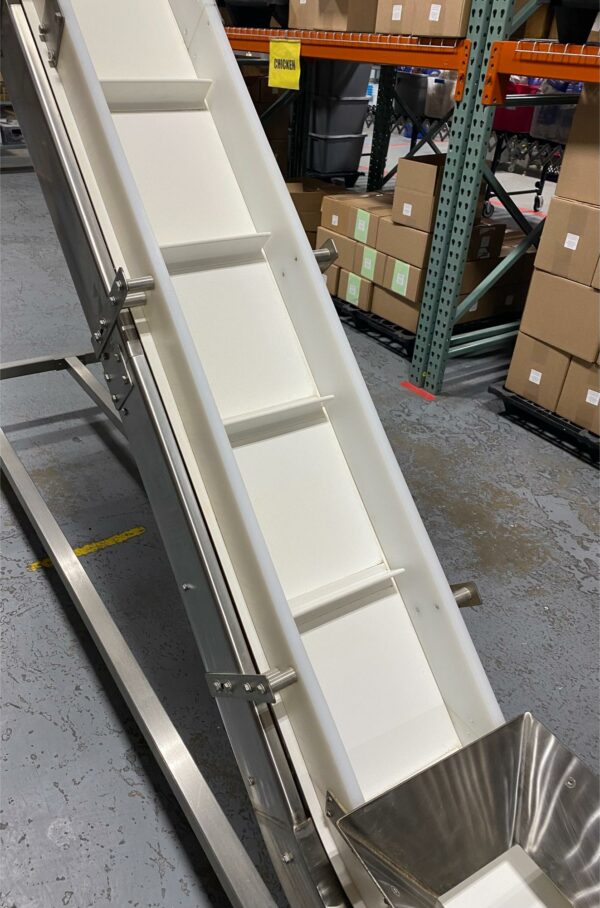 Fully WashDown Nae Pack Cleated Incline Conveyor with 10 Foot Discharge Height