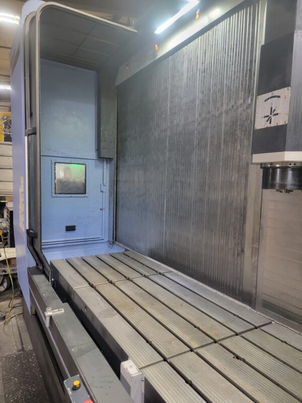 Doosan VCF 850LSR 4 Axis VMC, 2019 - Tilting B-Axis, Renishaw Probe, Tool-Setter, LNS Conveyor - Image 2
