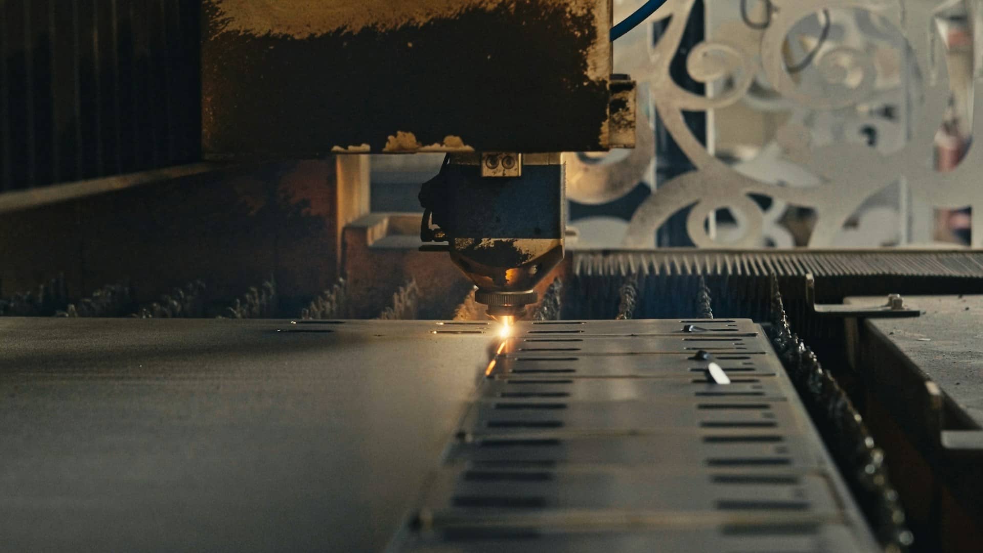 Industrial machine cutting metal