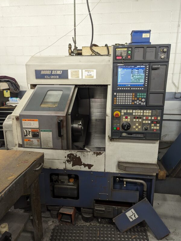 Mori Seiki CL203 CNC Lathe, 1999 - Chip Conveyor