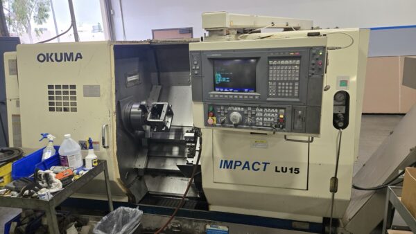 Okuma Impact LU15 CNC Lathe, 1995 - Dual Turret, Tailstock, Chip Conveyor