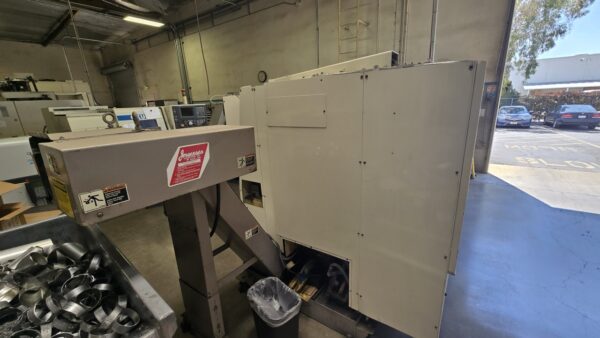 Okuma Impact LU15 CNC Lathe, 1995 - Dual Turret, Tailstock, Chip Conveyor - Image 9