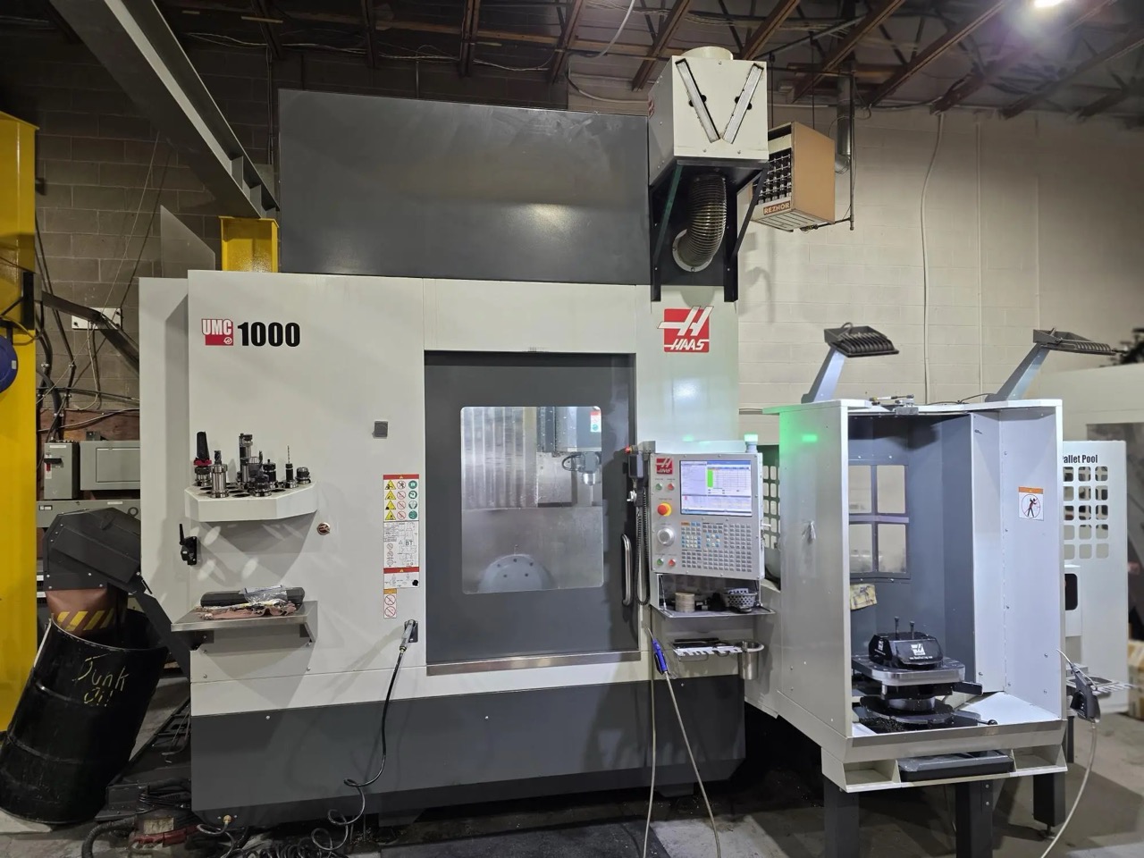 Haas UMC-1000 5-Axis CNC UMC, 2021 - 10-Pallet Changer, 15,000 RPM Spindle, WIPS, Through-Spindle Coolant, Chip Conveyor, Rigid Tapping