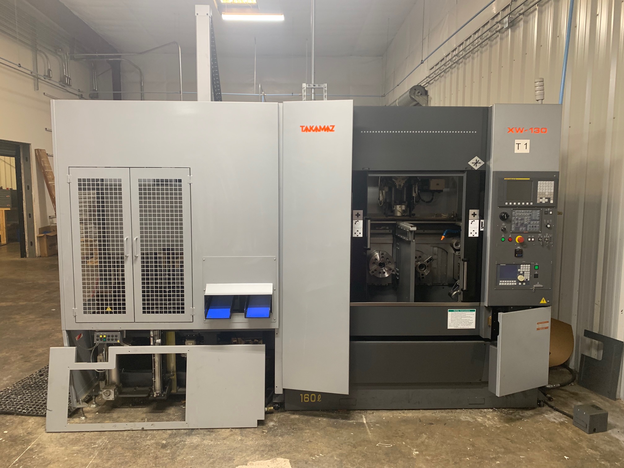 Takamaz XW-130 Twin-Spindle CNC Turning Center, 2016 - GTH150 Gantry Loader, Fanuc 0i-TD & 16-Station Stocker
