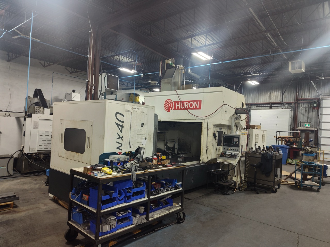 Huron NX40 Double Column Bridge Gantry Machining Center, 2013 - J30 High Pressure Through Spindle Coolant System, Chip Conveyor, Tooling, Siemens Sinumerik Control