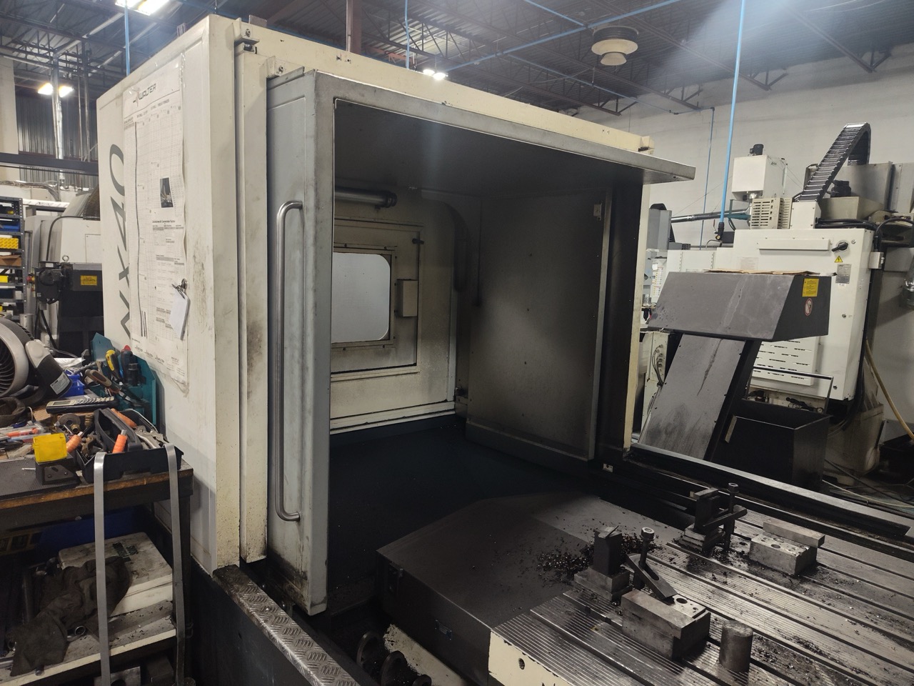 Huron NX40 Double Column Bridge Gantry Machining Center, 2013 - J30 High Pressure Through Spindle Coolant System, Chip Conveyor, Tooling, Siemens Sinumerik Control - Image 3