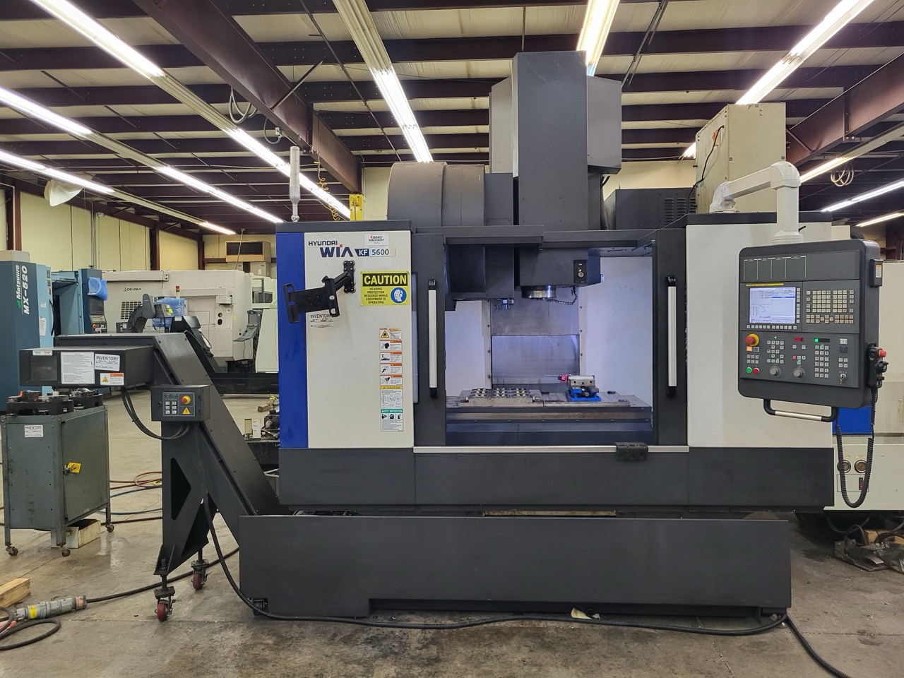 Hyundai WIA KF5600 VMC, 2018 - Fanuc, High Pressure Coolant, Chiller, Conveyor, Low Hours